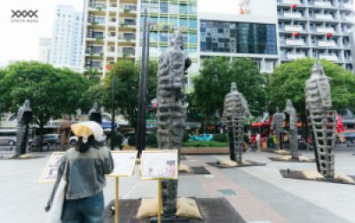 When Young People Stop Before a Sculpture